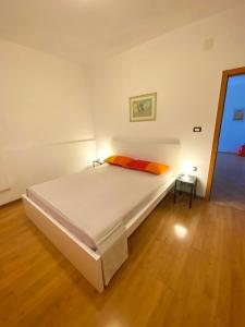 a bedroom with a large bed in a room at Salis in Novigrad Istria