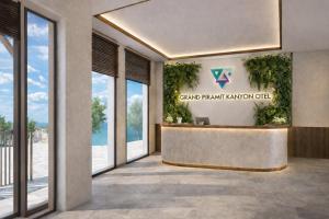 a rendering of the lobby of the grand franklinlation office at Grand Piramit Kanyon Hotel in Pınarbaşı