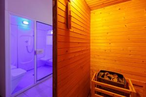 a bathroom with a toilet and a walk in shower at Borgo Medievale in Castelmola +80 photos