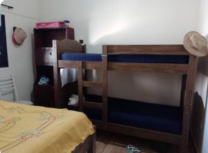 a bedroom with two bunk beds in a room at Rancho Macalé Balneário de Rancharia Sp in Rancharia +20 photos