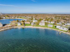 an aerial view of a small island in a body of water at Cape Cod Waterfront with Stunning Views in Buzzards Bay +60 photos