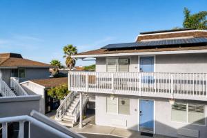 an aerial view of a building with a balcony at Pacific Inn Monterey in Monterey
