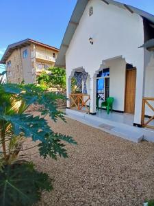 a view of the front porch of a house at Sun house kendwa beach in Kendwa