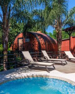 a resort with a swimming pool and a yurt at Casa Naiyari in Tepic