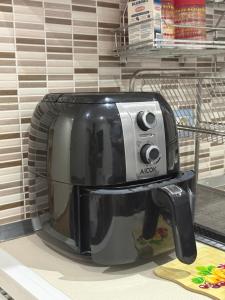 a toaster sitting on a counter in a store at Serena Guest House in Caserta