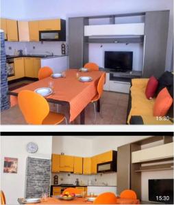 a kitchen and a living room with a table and a couch at Casa Arborea in Sennori