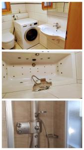a bathroom with a sink and a toilet and a sink at Chalet Adler in Grächen