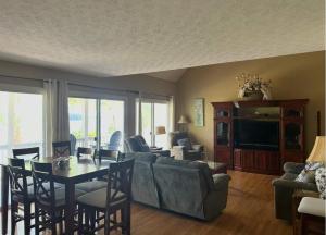 a living room with a couch and a table at High Cotton in Leesburg +7 photos