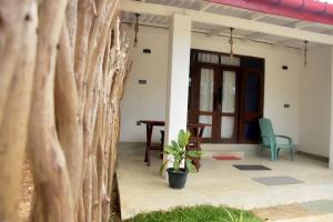 a view of the front porch of a house at Miu Villa in Ahangama