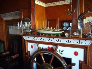 a kitchen with a wooden counter top with a wheel at Villa Rothsay Hotel in Cowes
