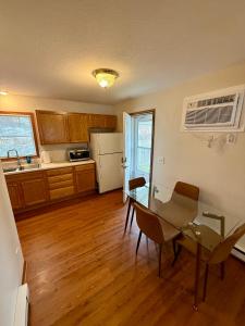 a kitchen with a table and a dining room at Wildcat 4020 in Marion
