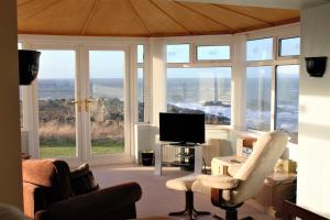 A television and/or entertainment centre at Corsewall Lighthouse Hotel