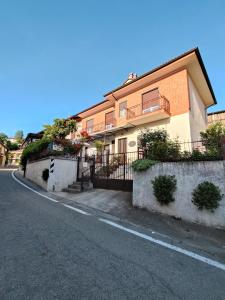 a building on the side of a street at Affittacamere San Rocco in Aramengo