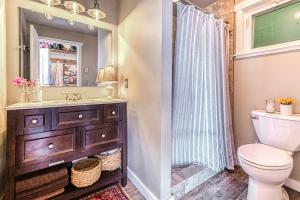 a bathroom with a sink and a toilet at 2BR Beachfront Cottage w/ Grill & Expansive Deck in Point Roberts +34 photos