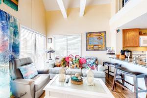 a living room with a couch and a table at Plantation West #1354 in Gulf Shores