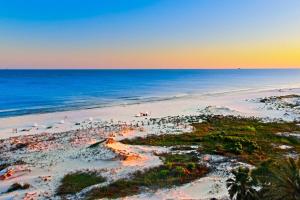 an aerial view of a beach with people and the ocean at Gulfside Townhomes 23 in Gulf Shores