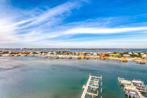 an aerial view of a marina with boats in the water at Bella Luna 1203 in Orange Beach