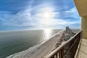 a view of the beach from the balcony of a condo at Phoenix West 2601 in Orange Beach