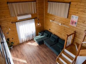 an overhead view of a living room with a green couch at Villa Maris in Demre