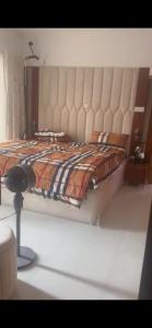 a bed in a room with at Yaba Elite Stays in Lagos