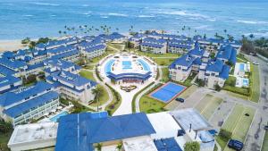 an aerial view of a resort near the ocean at Caribbean Beachfront Resort in Puerto Plata
