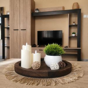 a living room with candles on a table at Apartments Barocco in Golubac