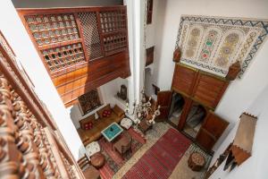 an overhead view of a living room with a staircase at Dar Rass Jnane - Rooftop - Luxury Stay in Fez