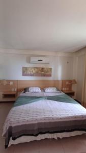 a bedroom with a large bed in a room at Kariri Beach Waterfront Retreat in Caucaia +29 photos