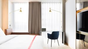 Et tv og/eller underholdning på Ruby Emma Hotel Amsterdam by IHG