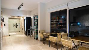 a dining room with a table and chairs at TK Royal Hotel & SPA in Hurghada