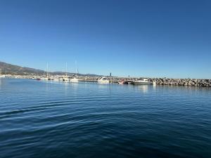 a large body of water with boats in it at costa blanca marbella in Marbella