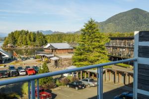 a view from a balcony of a town with a parking lot at Tofino Resort + Marina in Tofino