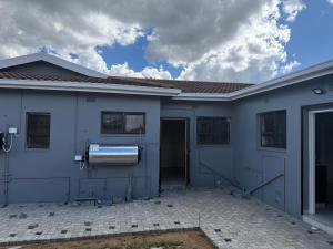 a house with a toilet in the side of it at 3 on Eland in Vryheid