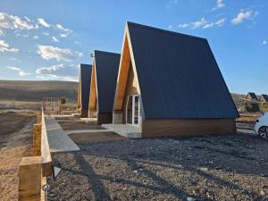 a house under construction with a blue roof at Mountain Houses Jakov in Žabljak +10 photos