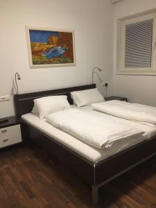 Posteľ alebo postele v izbe v ubytovaní Appartement Feinsinn