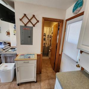 a kitchen with a sink and a shower in a room at NC 12 56821-9 Condo in Hatteras