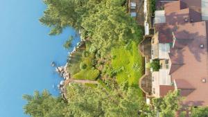 an overhead view of a hill with houses and trees at Taean Supsogui Bada Pension in Panggal-li +23 photos
