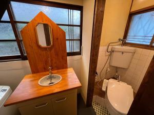 a bathroom with a sink and a toilet at 十度-jude- in Osaka +14 photos