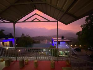 a view of a house with a roof at Amber Mount Resorts in Kanthalloor