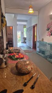 a table in a living room with some food on it at Laxmi Happy Home in Querim Goa in Querim