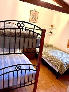 a bedroom with two bunk beds in a room at 2 bedroom Guesthouse in the Centre of Noojee in Noojee