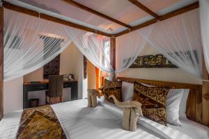 Letto o letti in una camera di Gefecon Villa Ubud