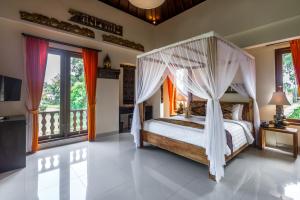 Letto o letti in una camera di Gefecon Villa Ubud