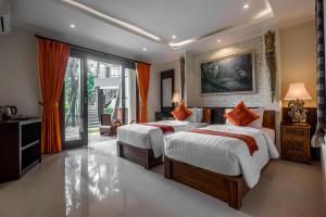 Letto o letti in una camera di Gefecon Villa Ubud