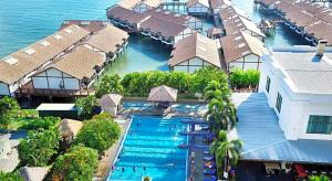 an aerial view of a resort with a swimming pool at Brassalova Signature Stay in Port Dickson