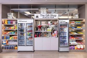 a gift shop with two refrigerators in a store at Magic Moment Resort & Kids Club, Dazzler Select by Wyndham in Kissimmee +169 photos