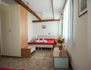 Un pat sau paturi într-o cameră la Casa Sant'Andrea