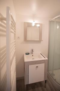 a white bathroom with a sink and a shower at L'évasion authentique du Vercors in Saint-André-en-Royans +82 photos