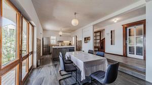 a kitchen and dining room with a table and chairs at Villa Matej by Villas Guide in Zaton