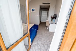 Posteľ alebo postele v izbe v ubytovaní Hotel Aleksandria